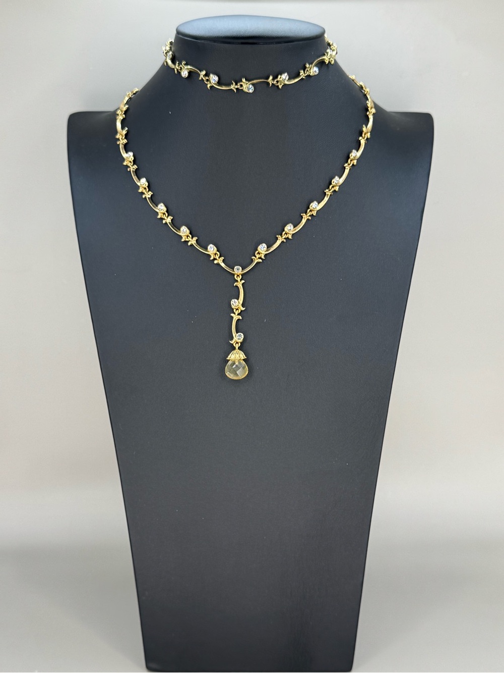 Vintage Avon gold tone  rhinestone necklace & bracelet set with teardrop pendant